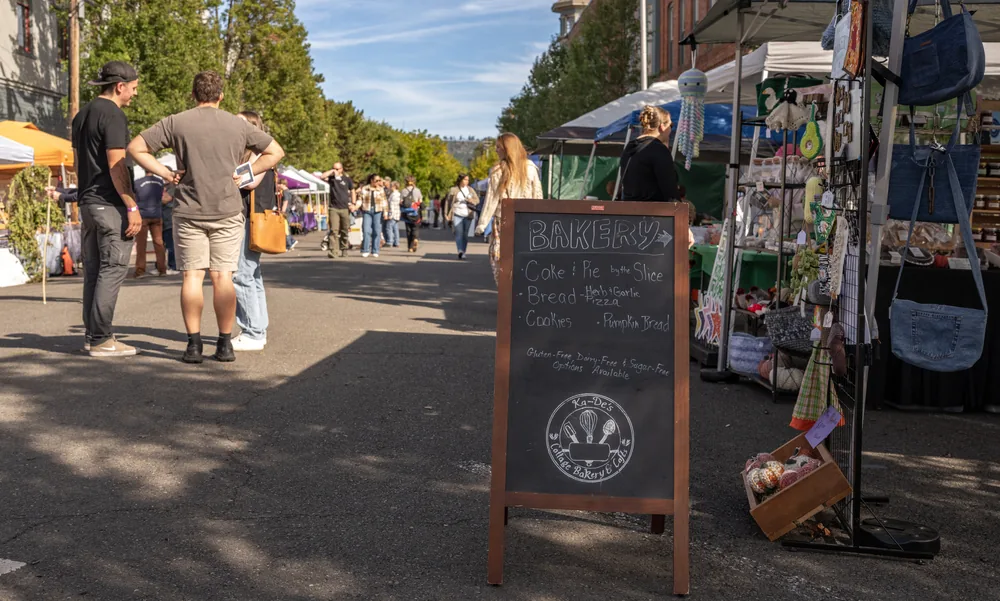 Maker and food vendor booths lining C Street for the Heritage Market